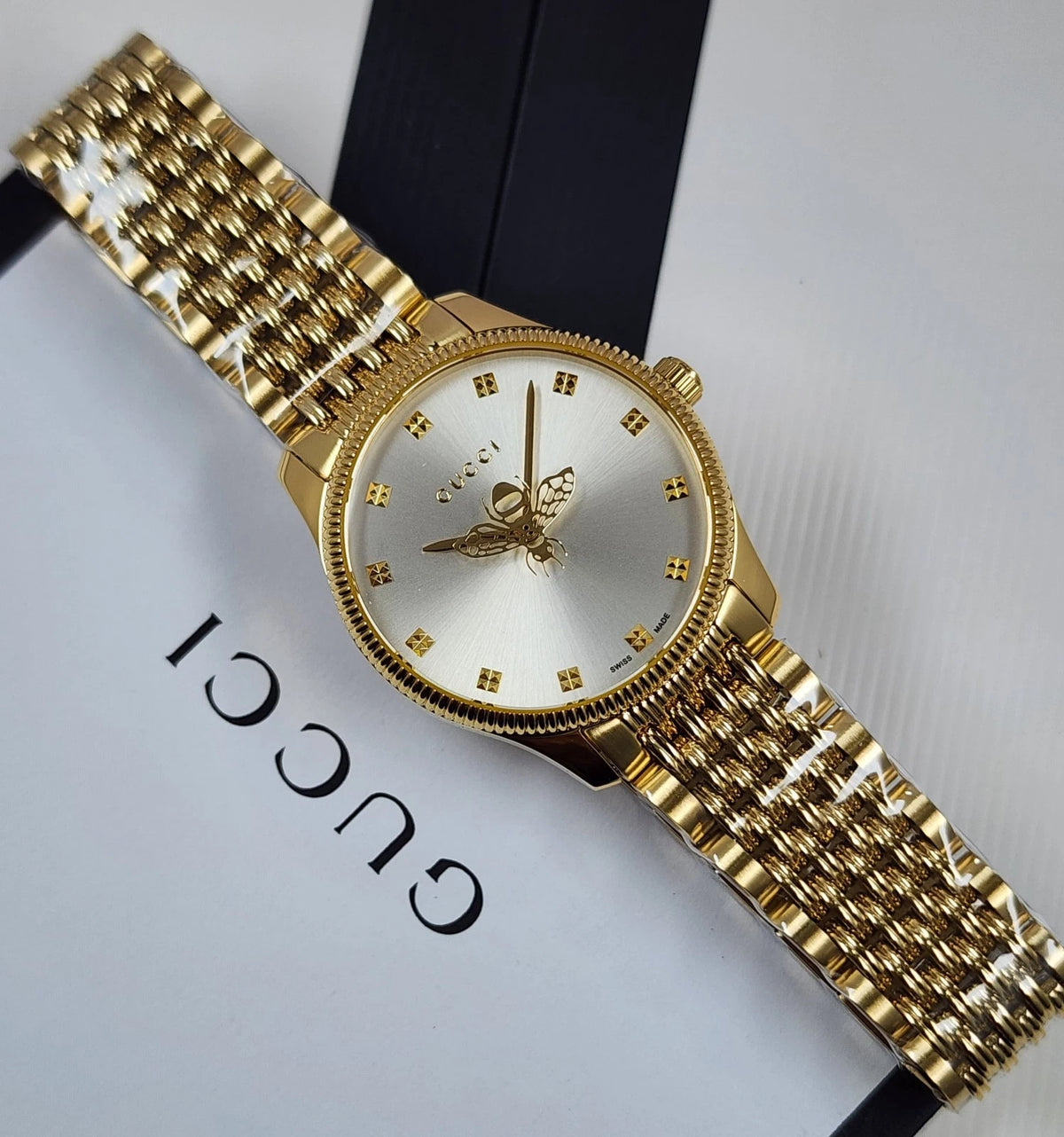Gucci G-Timeless YA1265021 Women’s Quartz Watch Silver Dial Gold Bracelet 29mm