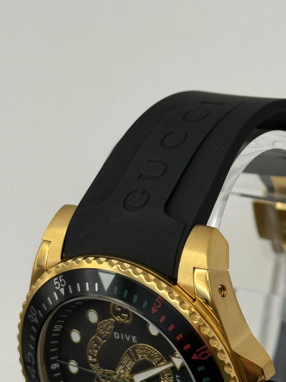 Gucci Dive Black Dial Gold-Tone Rubber Strap 45mm. Men's Watch YA136219